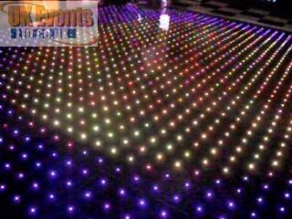 black and white starlit LED floor with pink uplighters